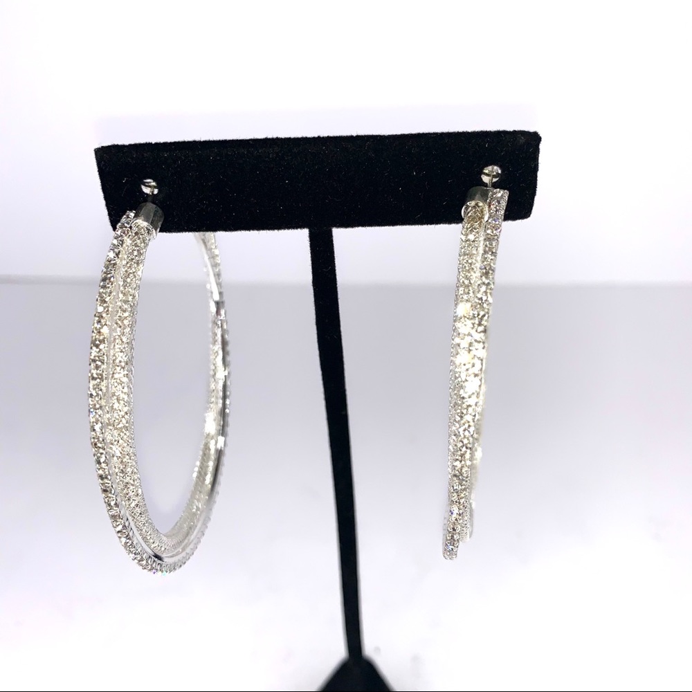 Silver tone 2 1/2”wide CZ Pierced Earrings